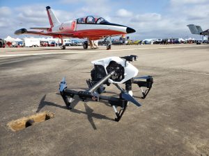 DJI Inspire next to a jet